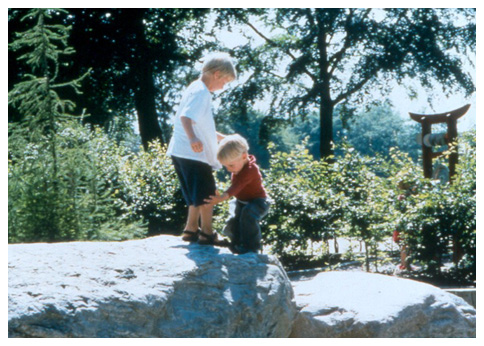 Children climbing on rocks