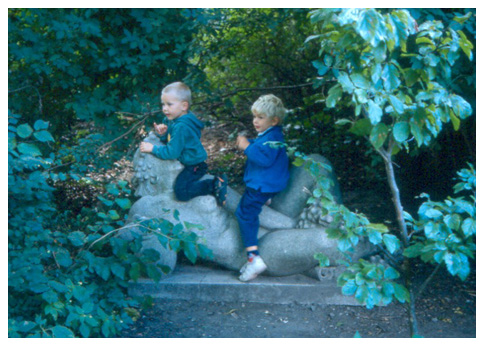 Children climbing on sculptures